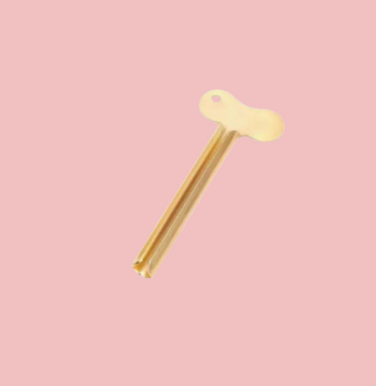 Gold colour tube key